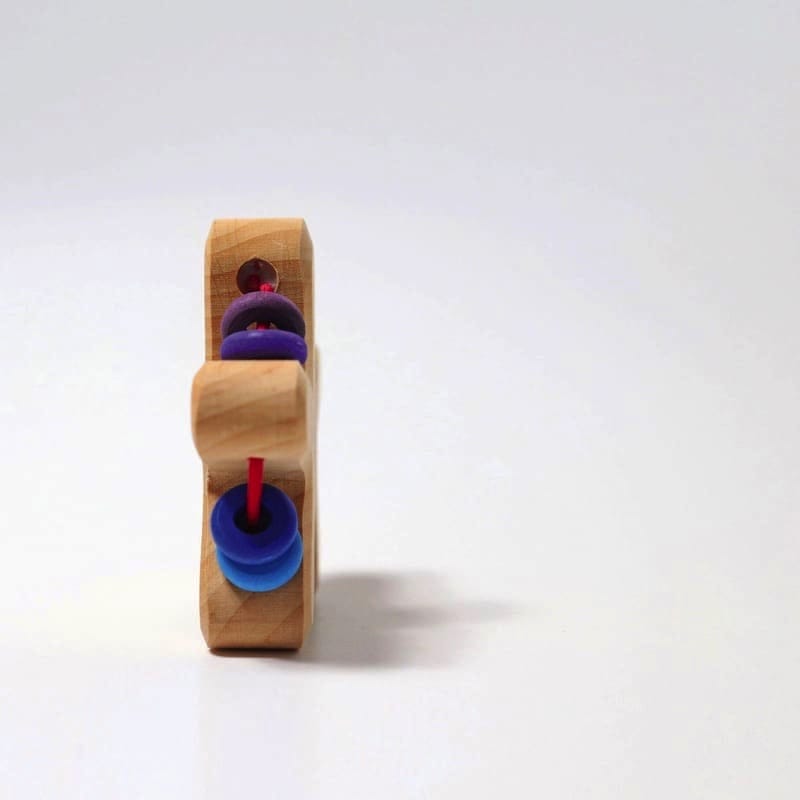 Sonajero estrella arcoiris de Grimm's en Libélula Azul