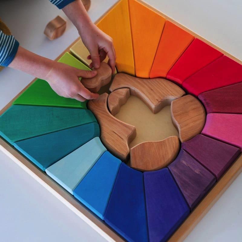 Bloques y puzzle león arcoiris de Grimm&#39;s en Libélula Azul