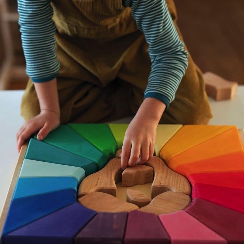 Bloques y puzzle león arcoiris de Grimm&#39;s en Libélula Azul