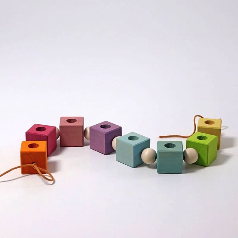 Anillo de cumpleaños cubos tonos pastel de Grimm&#39;s en Libélula Azul