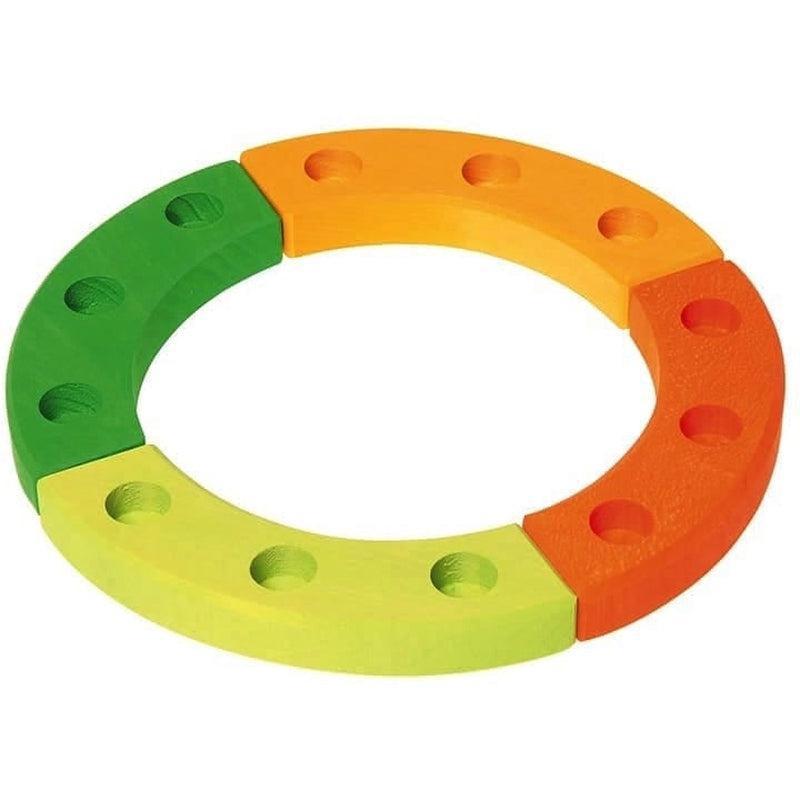 Anillo de cumpleaños verde-naranjo