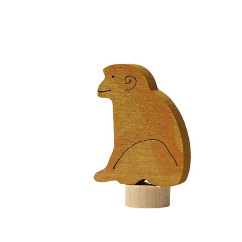 Figura decorativa mono sentado