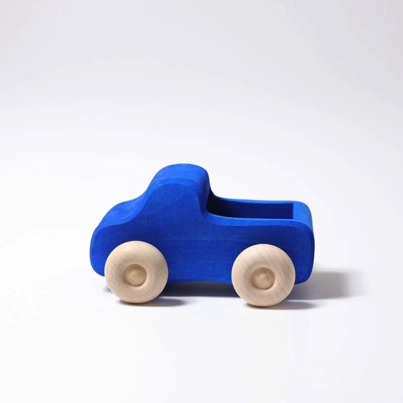 Camión pequeño azul de Grimm&#39;s en Libélula Azul