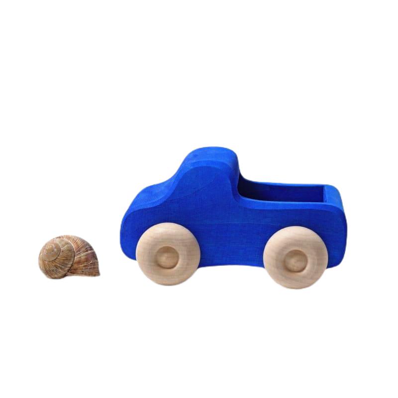 Camión pequeño azul de Grimm&#39;s en Libélula Azul