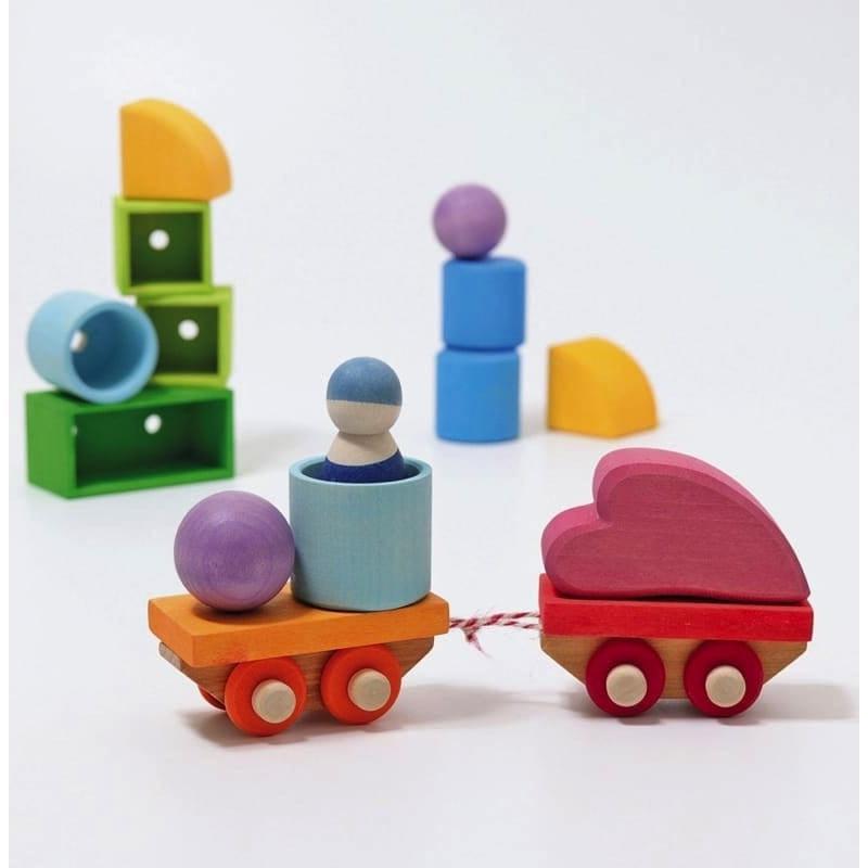 Tren de madera para construir de Grimm&#39;s en Libélula Azul