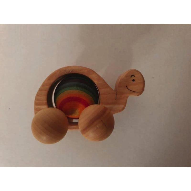 Tortuga de arrastre con bola arcoiris